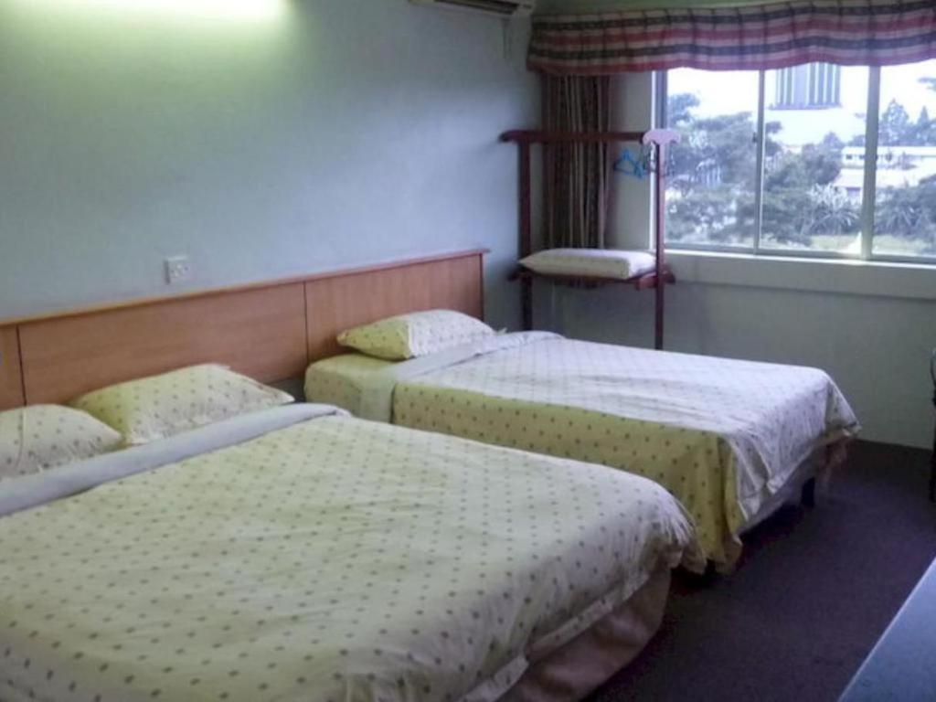 Hotel Hung Hung Кучинг Экстерьер фото