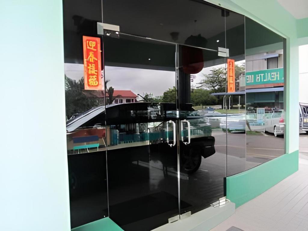 Hotel Hung Hung Кучинг Экстерьер фото